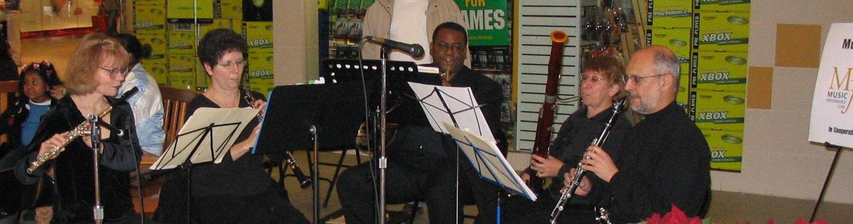 Photo of Pastoral
Winds performing at Moorestown Mall on December 8, 2005